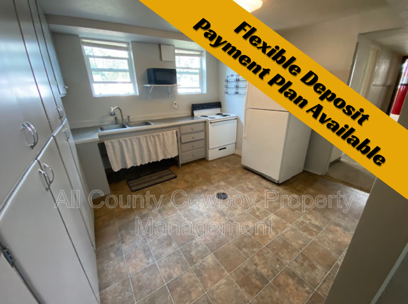 Laramie Condo: 1116 1/2 E. Harney