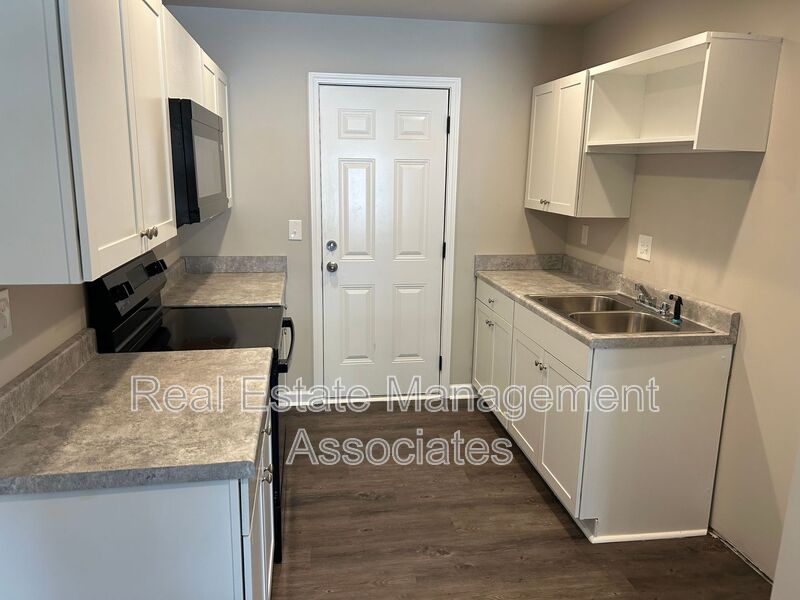 Griffin Condo: 215 W Quilly St.