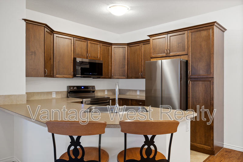 Kelowna Condo: 104-1007 Harvey Ave