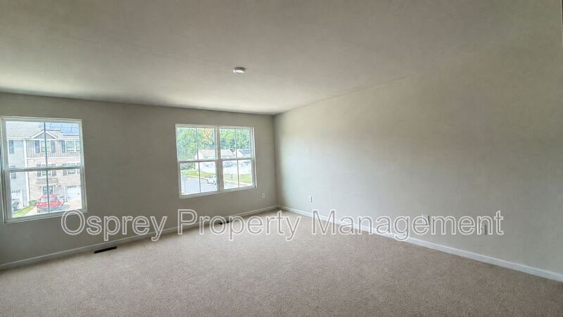 Charming 3-Bedroom Suffolk Home with Garage & Deck - Photo 5